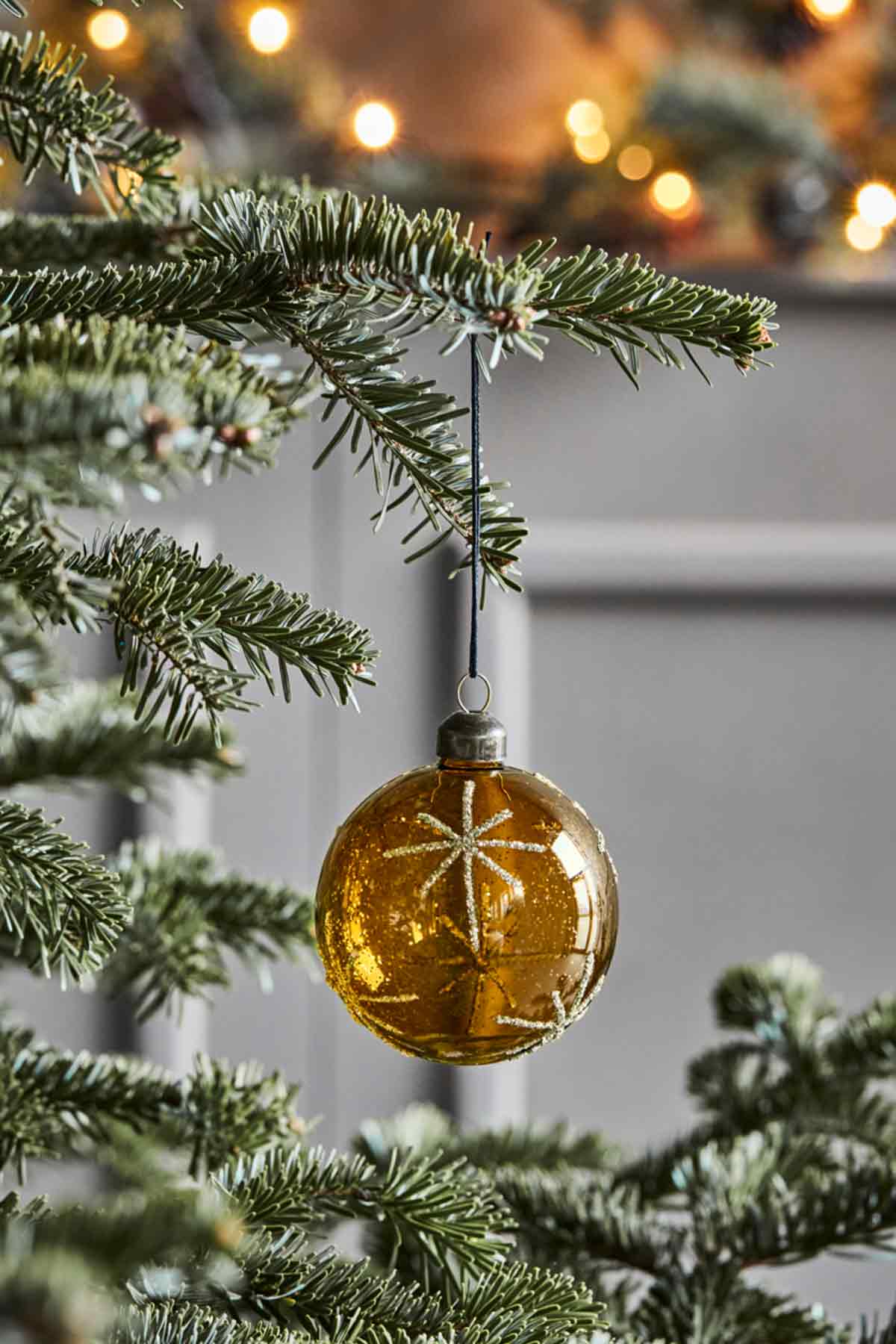 house_doctor_206863096_weihnachtskugel_star_amber_gold_01
